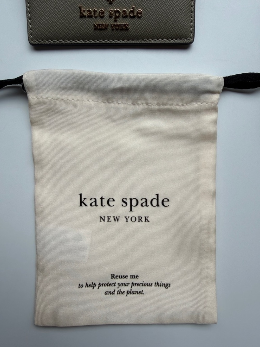 kate spade card holder & passport wallet with gold logo in oyster shell color - Picture 7 of 14